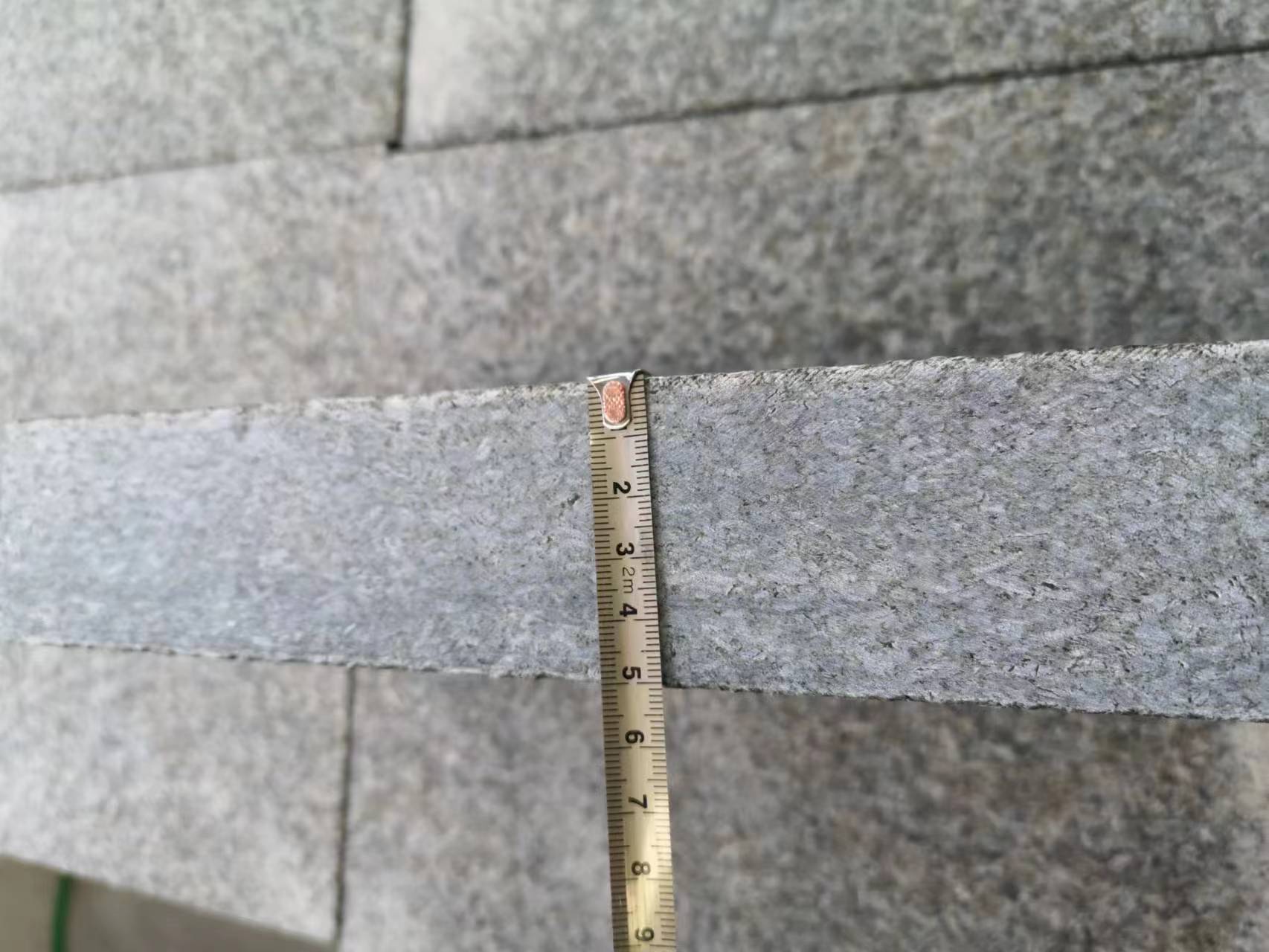 Chengde Green Granite Paver Granite — Verifying paver width tolerance with a tape measure during size check at Sun Young Stone