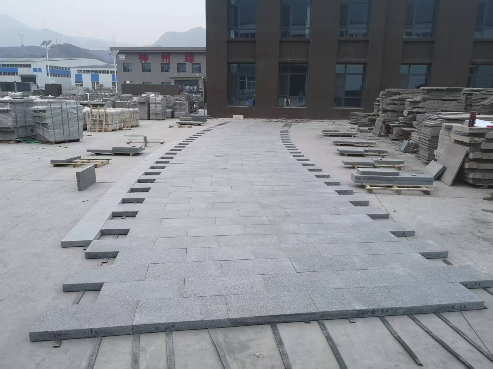 Chengde Green Granite Paver Granite — Full dry-lay layout of the paver order before packing at Sun Young Stone
