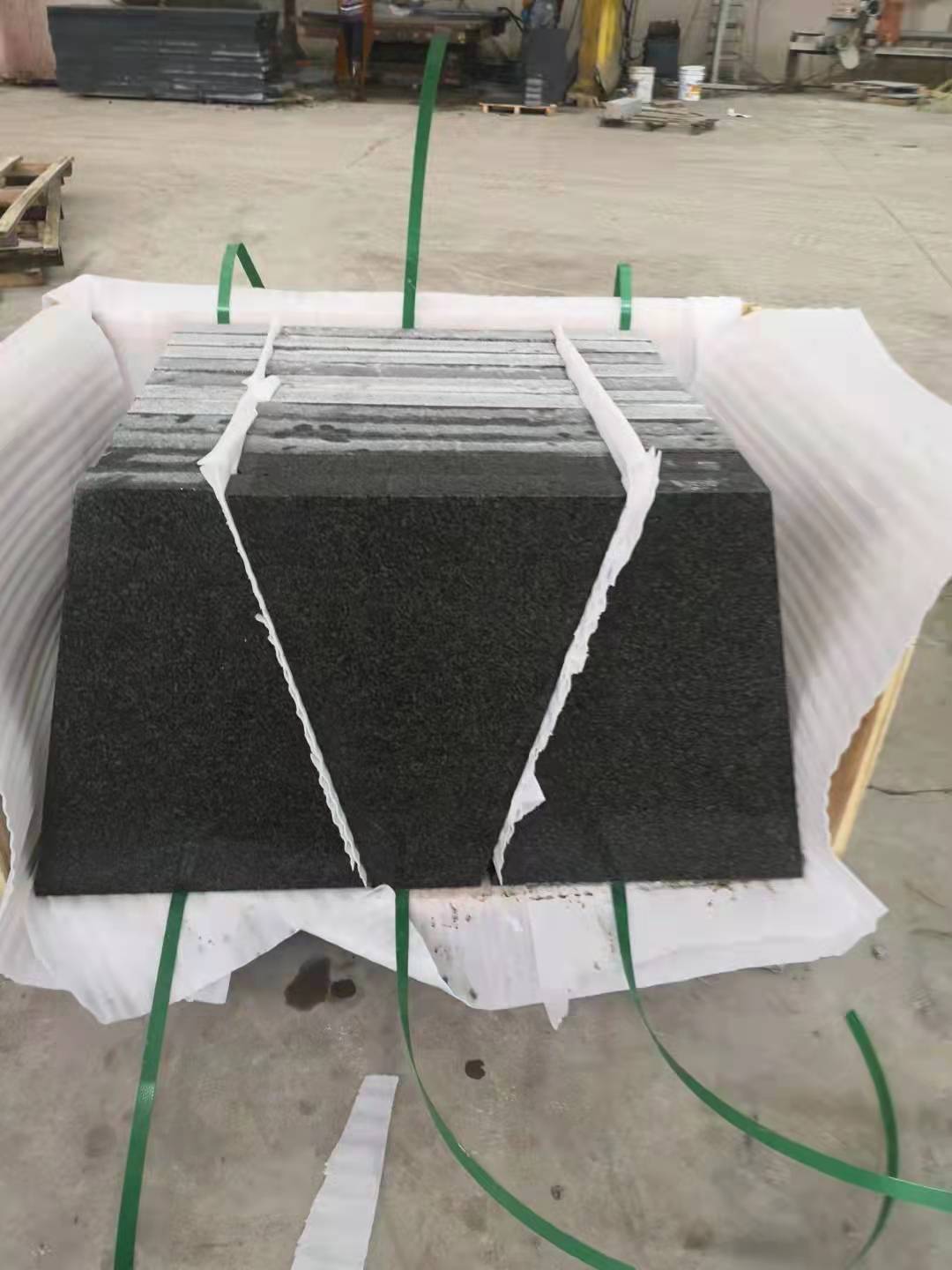 Chengde Green Granite Paver Granite — Pavers cushioned and strapped onto a timber export pallet for packing at Sun Young Stone