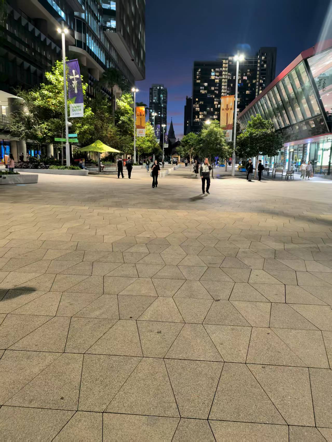 Chengde Green Granite Paver Granite — Chengde green granite pavers laid in a curved public plaza walkway at night