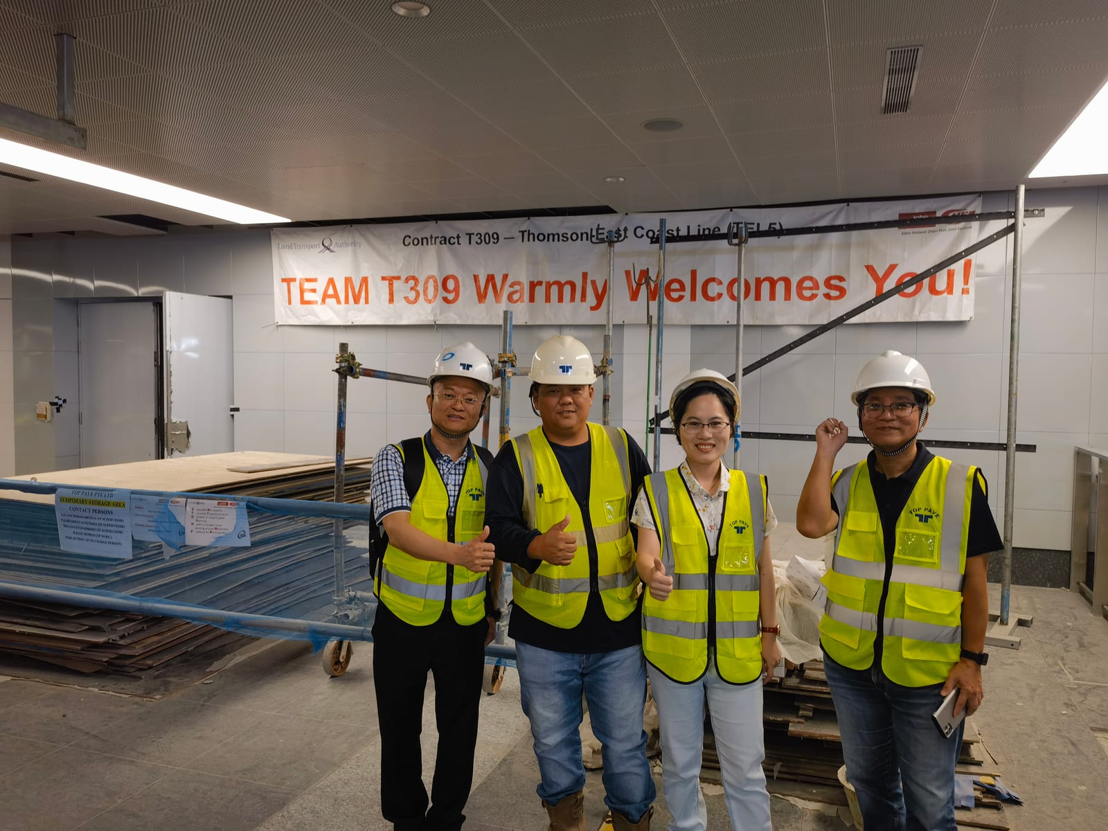 Sun Young Stone team on site at the Siglap MRT Station (Contract T309, Thomson–East Coast Line) in safety vests and helmets