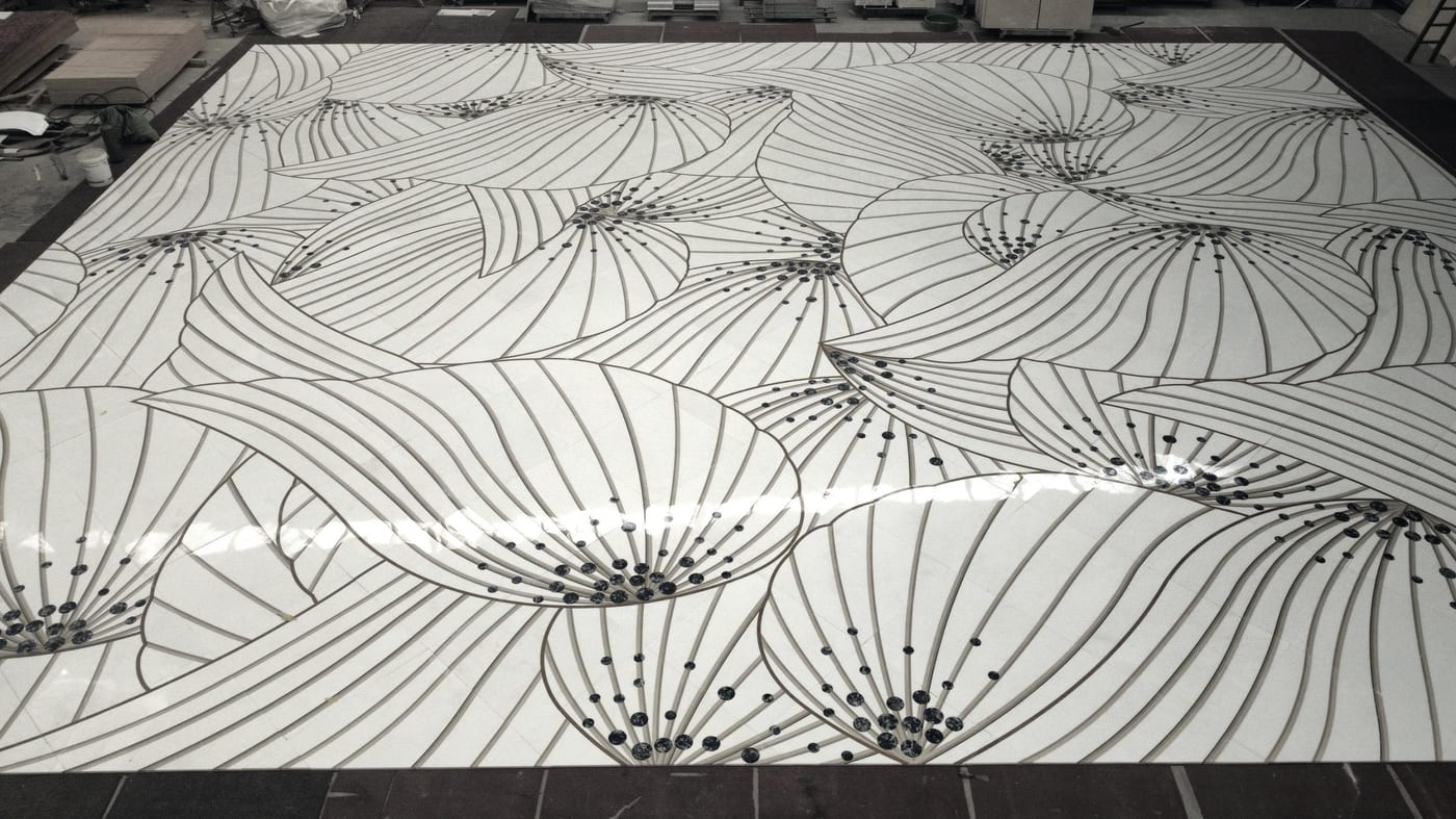 Finished water-jet marble pattern floor dry-laid in the factory, matching the design drawing